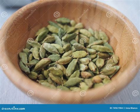 Classical Spices Cardamom Seeds In Wooden Bowl Spain Stock Photo