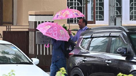 In Photos Rain Lashes Parts Of Mumbai Amid Forecast Of Moderate Showers