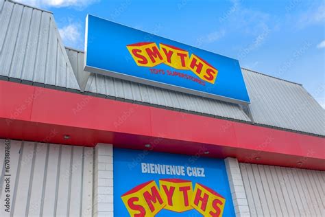 Smyths Toys Superstore logo brand and text sign in wall facade toys ...