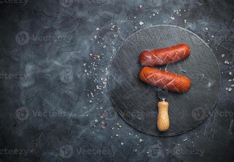 Grilled Sausages On A Fork Dark Background 38588024 Stock Photo At