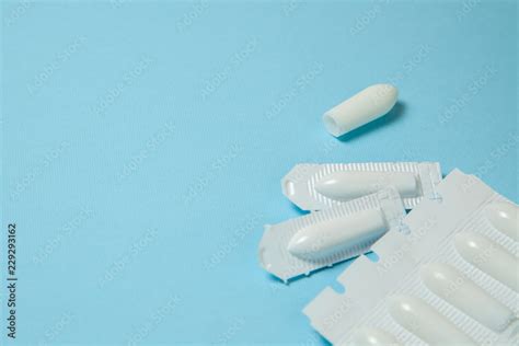 Suppository For Anal Or Vaginal Use On A Blue Background Candles For