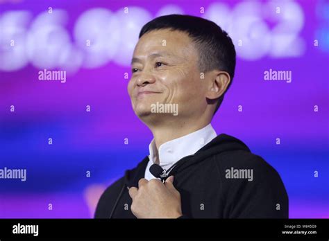 Jack Ma or Ma Yun, Chairman of Alibaba Group, reacts in front of a ...