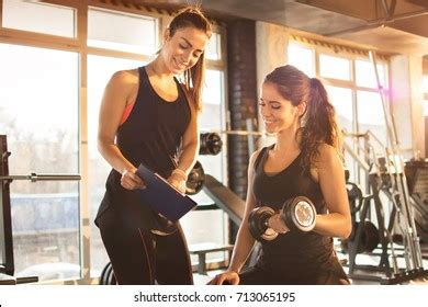 Portrait Personal Trainer Clipboard Showing Thumb Stock Photo 577570297