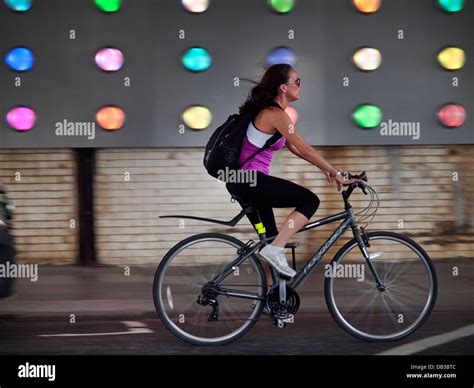 Riding a bike in London Stock Photo - Alamy