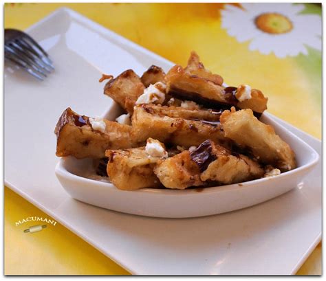 BERENJENAS FRITAS CON MIEL Y QUESO DE CABRA