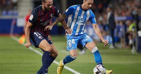 Im Genes De La Derrota Del M Laga Cf Ante El Sd Huesca En El Alcoraz