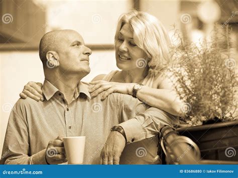 Mature Couple On Balcony With Coffee Stock Photo Image Of Elderly Merits