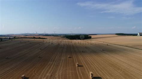 Large Wind Turbines With Blades In Field Aerial View Bright Orange