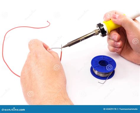 Soldering a Red Wire stock photo. Image of wire, solder - 43429178