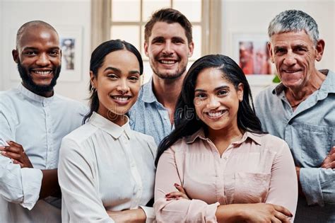 The Way To Success Is With Teamwork Portrait Of A Group Of Confident