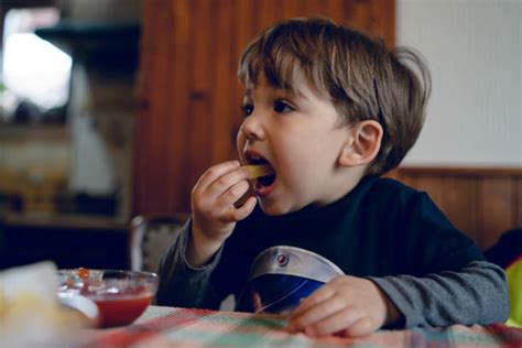 Baby Eating Chips Stock Photos Pictures And Royalty Free Images Istock