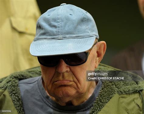 Defendant John Demjanjuk arrives at court for his trial on May 12,... News Photo - Getty Images