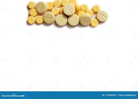 Closeup of Yellow Tablet on Isolated White Background. Tablets of ...