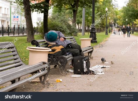 Drunk Man Sleeping On Park Bench Stock Photo 7799092 Shutterstock