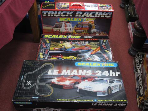 Lot 727 - Three boxed Scalextric sets to include Le