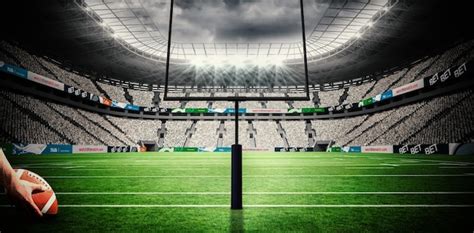 Premium Photo | Composite image of american football player preparing ...