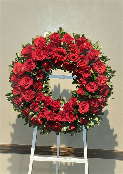 Wreath In Red Roses Flower Arrangements Glueckert Funeral Home