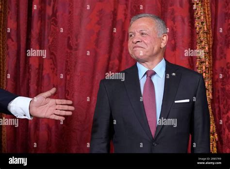 Jordan's King Abdullah II poses for photos before a reception and lunch ...