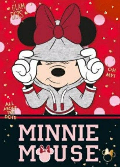 Minnie Mouse Is Wearing A Red Bow And Holding Her Hands Up To Her Head