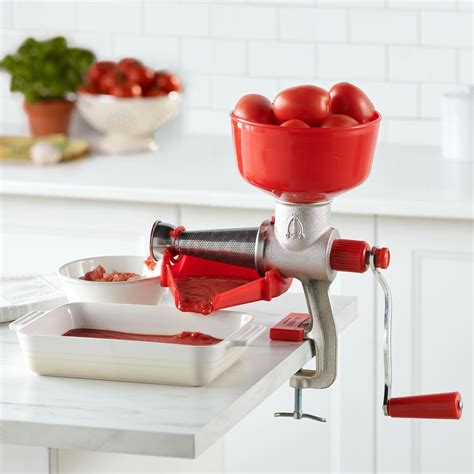 The Genuine Italian Tomato Press Hammacher Schlemmer