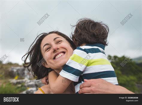 Boy Hugs Mom Woman Image And Photo Free Trial Bigstock