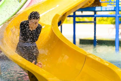 Premium Photo Close Up Of Yellow Slide In Playground