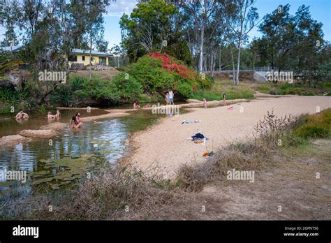 Tourists Relaxing In The Shallow Hot Water Pools At Innot Hot Springs North Queensland