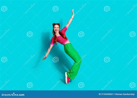 Full Length Photo Of Positive Excited Lady Dressed Pink Knitted Shirt Dancing Emtpy Space