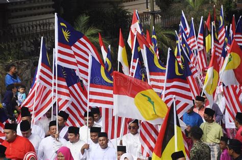 Members Of Political Party UMNO Holding UMNO Flag During Malaysia