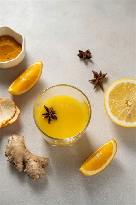 Immune Boosting Drink Ginger Orange Fruit And Turmeric Shot Drink