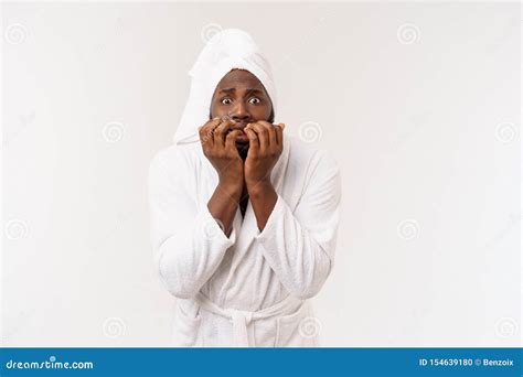 Portrait Of Excited Young African American Male Screaming In Shock And