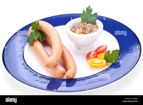 Ger Ucherte Wiener W Rstchen Mit Tomaten Garnitur Auf Einem Blauen