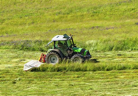 Mowing hay - 3 Photograph by Paul MAURICE