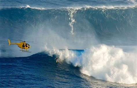 Surfers Conquer The Jaws Surf Break - Maui Hands