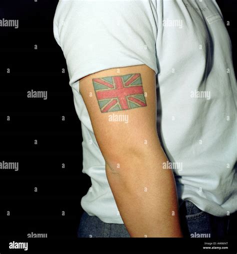 portrait of a man with a england flag tatoo on his arm Stock Photo - Alamy