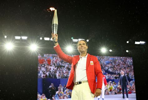 Picture Rafael Nadal S Stunning Paris Olympics Update Of Him Carrying The Olympic Torch Under A