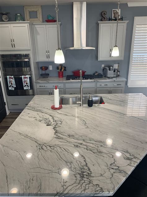 White Kitchen In Infinity White Quartzite Countertops Transitional