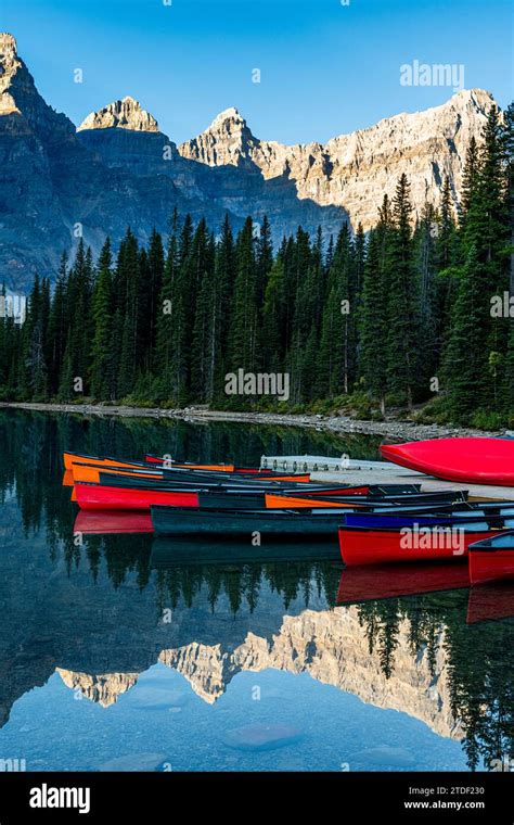 Canoes At Sunrise At Lake Moraine Banff National Park Unesco World