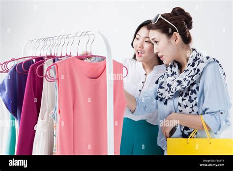 Portrait Of Mother And Daughter Shopping Clothes Stock Photo Alamy