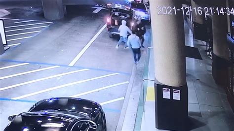 Exclusive Video Shows Man Being Robbed At Gunpoint While Unloading