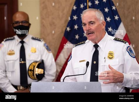 D C Metropolitan Police Chief Robert Contee III Left Looks On As U S