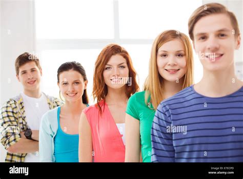 Smiling Male Student With Group Of Classmates Stock Photo Alamy