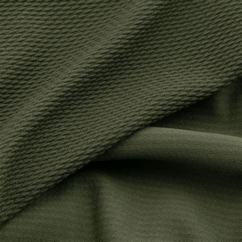 Olive Green Stretch Solid Bullet Textured Knitted Fabric For Garment