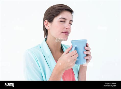 Pretty Brunette Drinking Coffee Stock Photo Alamy