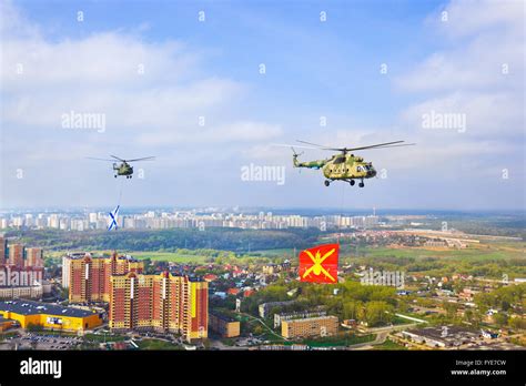 Helicopter With Military Flag Over Moscow At Parade Of Victory Day