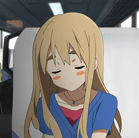 An Anime Character With Long Blonde Hair And Blue Shirt