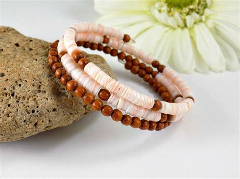 Pinkish Peach Heishi Sea Shell And Wood Bead Memory Wire Bracelet Pinned By