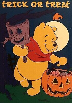 A Winnie The Pooh Trick Or Treat Sign