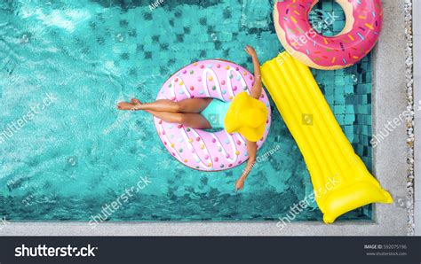 Woman Relaxing On Donut Lilo Pool Stock Photo 592075196 Shutterstock