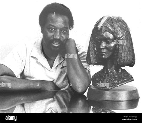 Artist Eddie Dixon is shown in this March 26, 1985 photo with one of ...